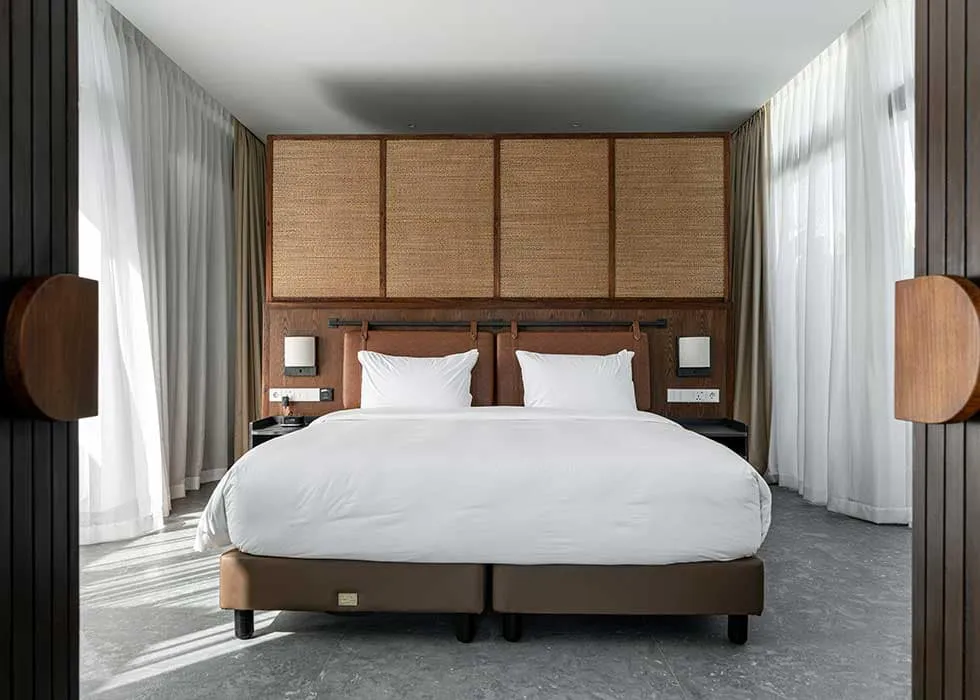 Pronoia one-bedroom villa — bedroom (completed Phase 1 photography)