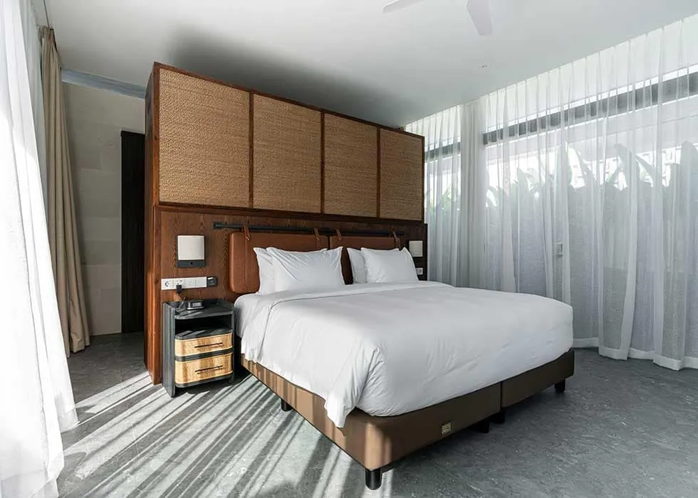 Pronoia one-bedroom villa — bedroom (completed Phase 1 photography)